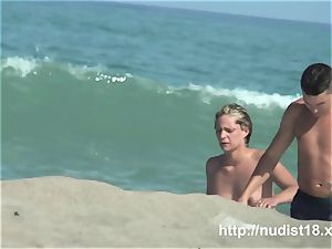 naked beach spycam shoots a steamy honey with a hidden web cam